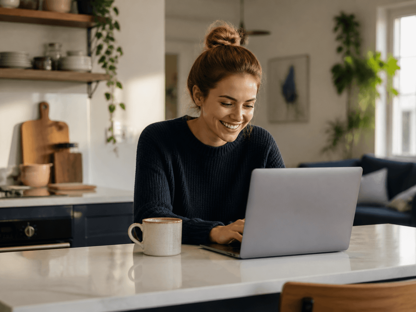 Young professional working remotely from a bright home